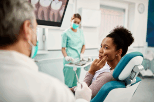 a patient speaking with their endodontist
